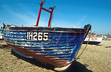 Comp image : boat0101 : Fishing boat with worn paint on the shingle at Aldeburgh, Suffolk, England