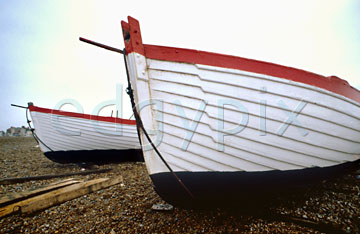 Comp image : boat0112 : White fishing boats against a plain sky on the shingle at Aldeburgh, Suffolk, England