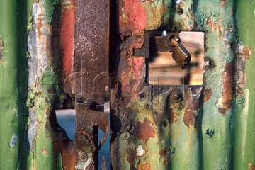 Comp image : dere0103 : Close up of rusty metal on a peeling green painted corrugated iron gate