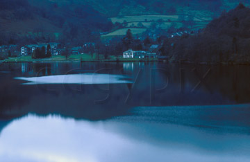 Comp image : ld02314 : Autumn evening view across Ullswater to Glenridding, in the Lake District, with a reflection of St. Sunday Crag