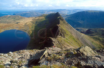 Comp image : ld04820 : The sharp ridge of Striding Edge seen from Hellvellyn, in the English Lake District, in autumn sunshine, with Red Tarn below