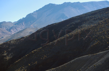 Comp image : mgun0824 : Heavily shadowed hillside in the foreground and distant hazy mountains, in the High Atlas mountain range in Morocco