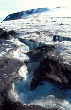 Comp image : torf0909 : A fast-running stream through the Torfajökull [Torfajokull] icecap, southern Iceland