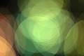 Bright abstract photo with overlapping green and orange circles