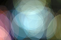 Bright abstract photo with overlapping white, pale blue and pink translucent circles