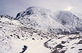 Great Gable and Green Gable under snow, seen from Sprinkling Tarn, in the English Lake District