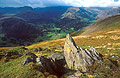 Sharp rocks on Place Fell, over Patterdale, looking towards Glenridding, in the English Lake District, in patchy autumn sun